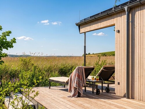 Guesthouse by a lake with sauna