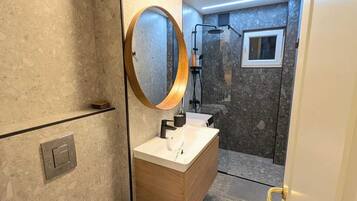 Shower, free toiletries, hair dryer, towels