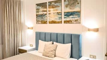 2 habitaciones, caja de seguridad en la habitación y escritorio