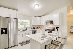 Fridge, microwave, stovetop, dishwasher - Walk to Romano Beachfront Park: Airy Home w/ Yard (Ormond Beach)