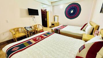 Eenvoudige vierpersoonskamer | Gratis wifi