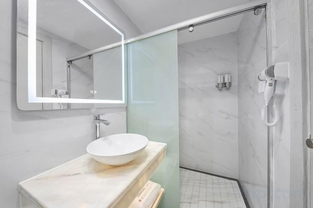 Bathroom | Shower, hair dryer, towels, soap