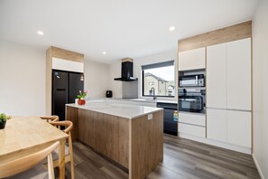 Townhome, City View | Private kitchen | Electric kettle, toaster