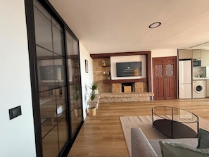 Standard Apartment, Partial Sea View | Living area | 40-inch TV with digital channels - La Nogalera Collection (Torremolinos)