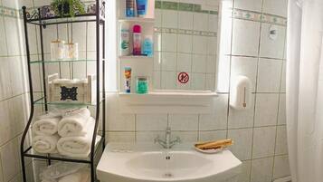 Hair dryer, towels, soap, shampoo