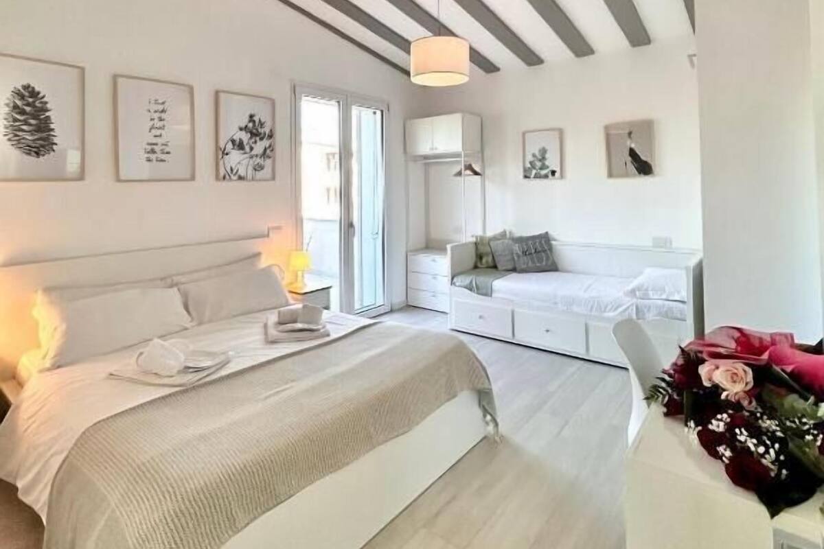 Triple Room, Courtyard View | Blackout drapes, soundproofing, iron/ironing board, free WiFi