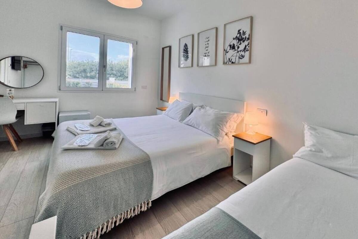 Triple Room, Courtyard View | Blackout drapes, soundproofing, iron/ironing board, free WiFi