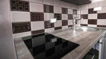 Superior studio, uitzicht op de stad | Privékeuken