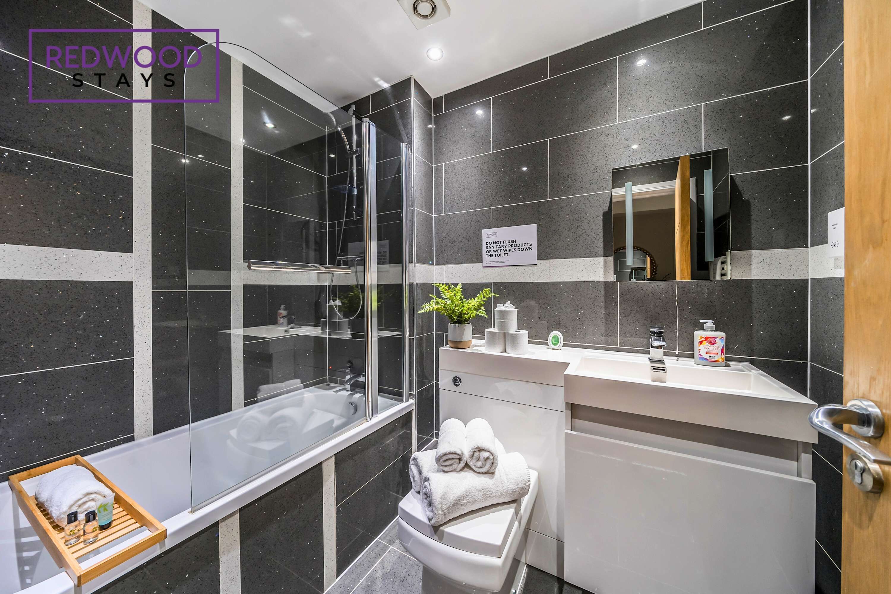 Shower, hair dryer, towels, shampoo
