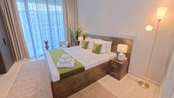 Departamento, 1 cama King size, vista a la alberca | Tabla de planchar con plancha y wifi gratis