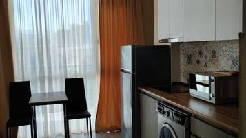 Fridge, microwave, coffee/tea maker, electric kettle