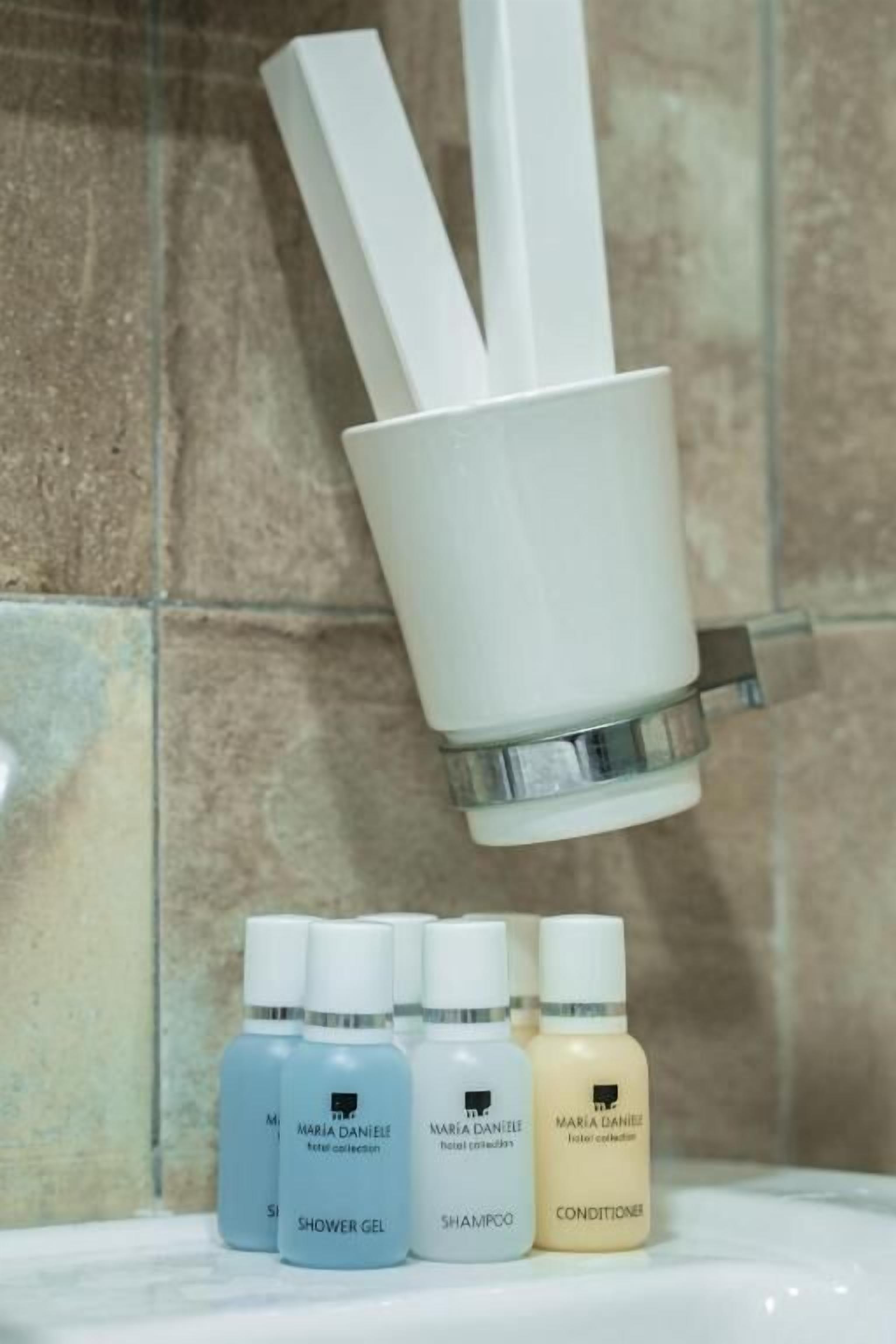 Hair dryer, slippers, towels, soap