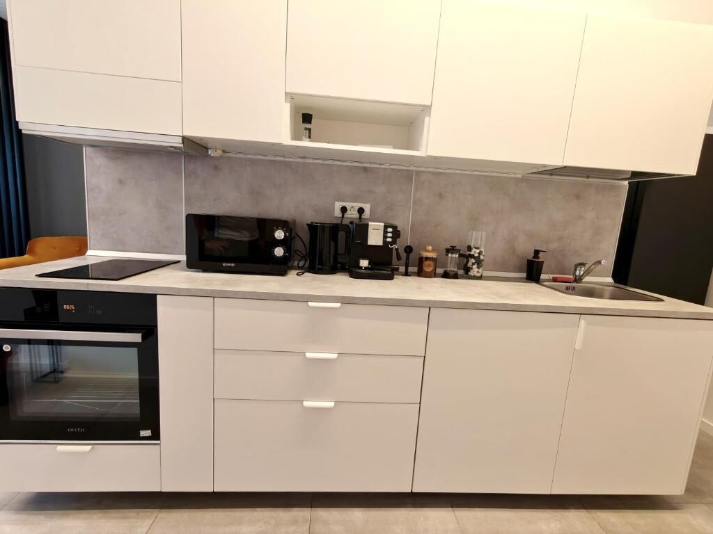 Comfort Apartment, Kitchen, City View | Private kitchen | Full-size fridge, oven, stovetop, espresso maker