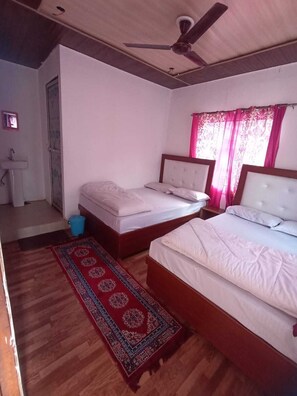Quadruple Room, Smoking | Laptop workspace, rollaway beds, bed sheets - Hotel Geeta Palace (Ukhimath)
