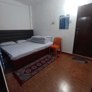 Triple Room, Smoking | Laptop workspace, rollaway beds, bed sheets - Hotel Geeta Palace (Ukhimath)