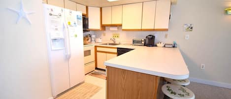 Condo, 2 Bedrooms | Private kitchen | Fridge, coffee/tea maker, toaster