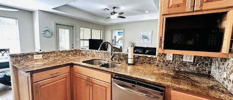 Coffee/tea maker, fridge, microwave, oven