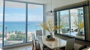 Deluxe Apartment, Balcony, Sea View | Dining room - Grand Marina Oceanview Apartments by Xarm Apartments (Santa Marta)