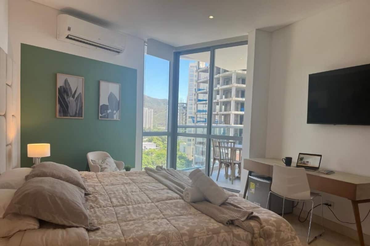 Suite, Balcony, Sea View | Desk, laptop workspace, iron/ironing board (on request), WiFi (free)