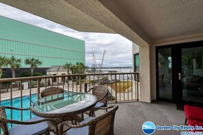 Outdoor dining - Channelfront Condo with a Pool! Across from the Ocean (Garden City Beach)