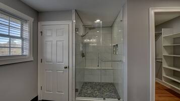 Shower, towels, soap, toilet paper