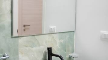 Double Room, City View | Bathroom | Free toiletries, hair dryer, slippers, towels