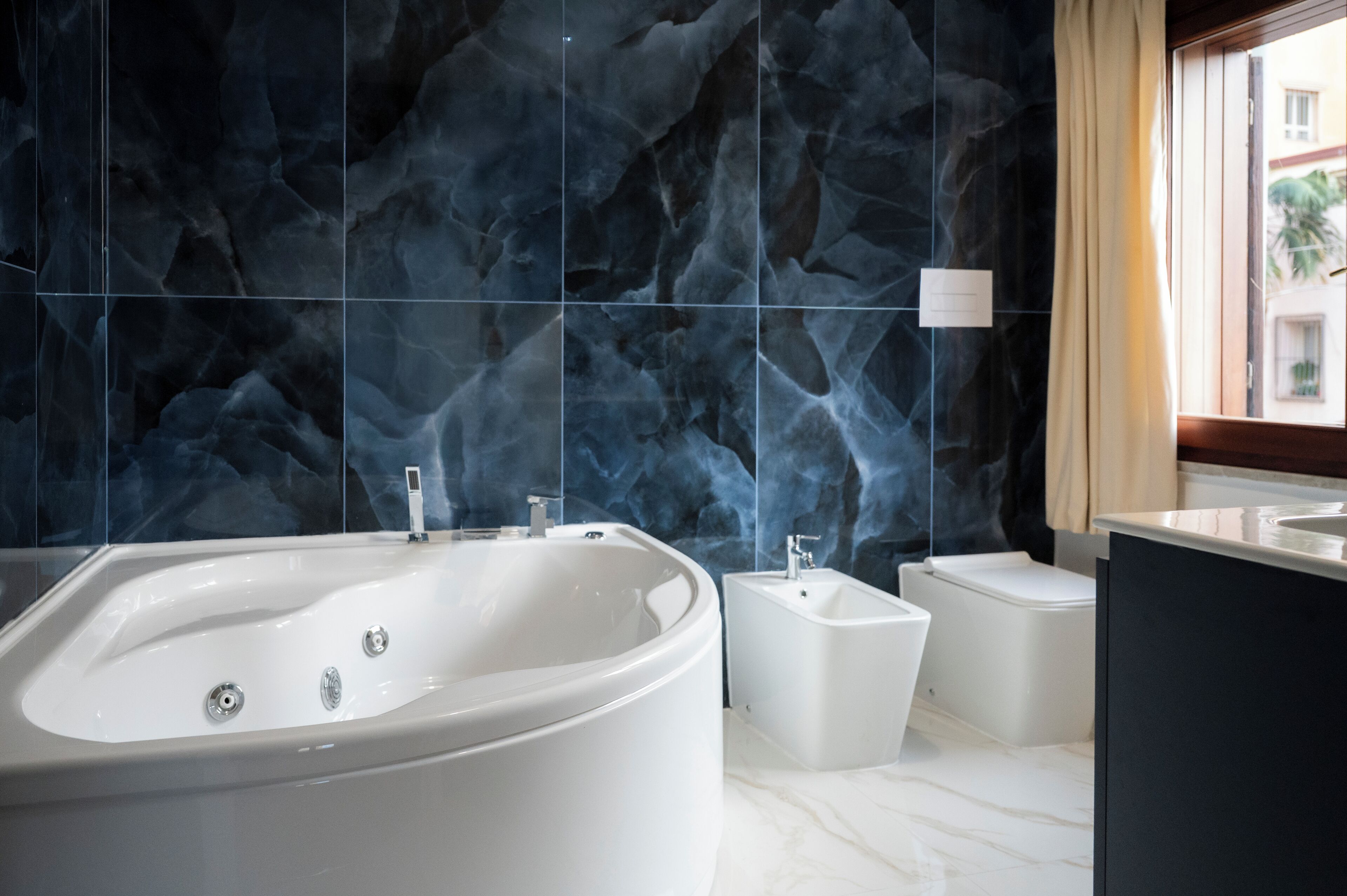 Double Room, City View | Bathroom | Free toiletries, hair dryer, slippers, towels