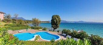 Two-bedroom apartment in a lakeside residence with swimming pool