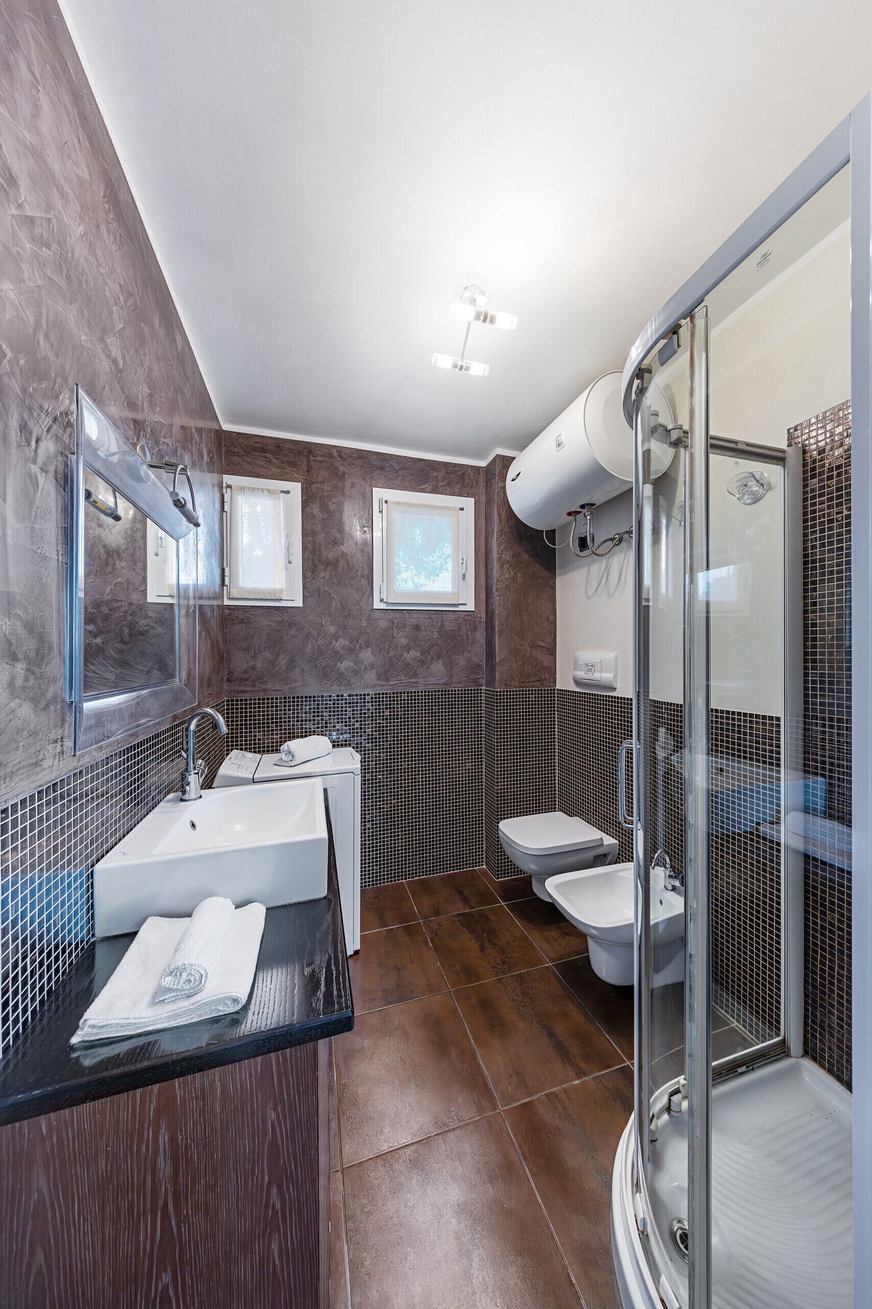 Doccia, asciugacapelli, bidet, asciugamani