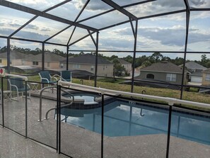Outdoor pool - 4 beds 3 bath Green home 3 miles from Disney with Solar Heated private pool (Kissimmee)