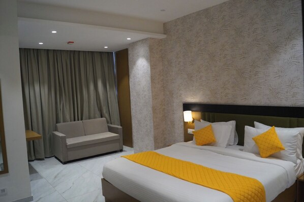 Deluxe Double Room, Non Smoking, City View | In-room safe, desk, laptop workspace, iron/ironing board - Solasta Stays (Pune)