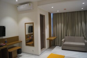 Deluxe Double Room, Non Smoking, City View | Living area | Printers - Solasta Stays (Pune)