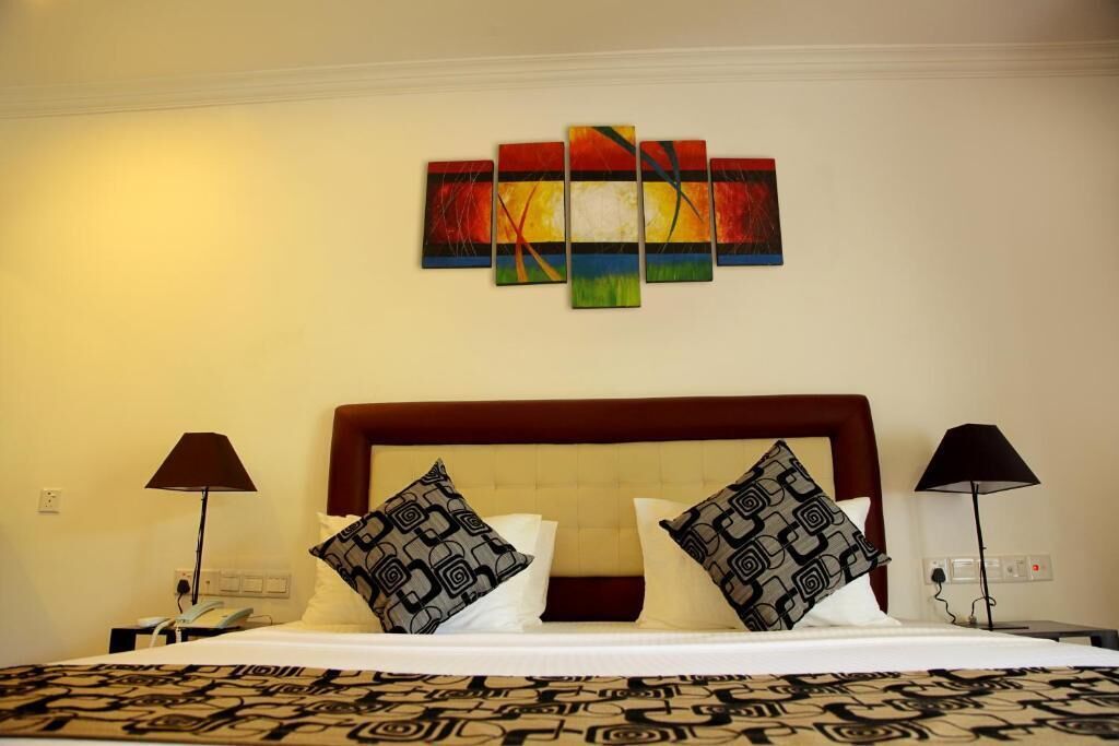 Deluxe Double Room, Balcony | Desk, iron/ironing board, free WiFi