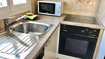 Apartamento, 1 quarto, para fumantes, piscina particular | Cozinha privada