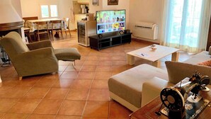 Apartament, 1 dormitori, fumadors, piscina privada | Sala d'estar