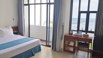 Deluxe Double Room, Beach View | Desk, free WiFi