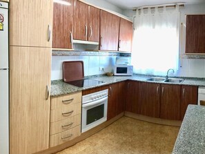 Private kitchen - Semi-detached House with Private Pool and Parking in Miami Platja (Miami Playa)