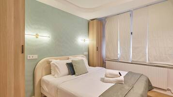 1 habitación, tabla de planchar con plancha, wifi y ropa de cama