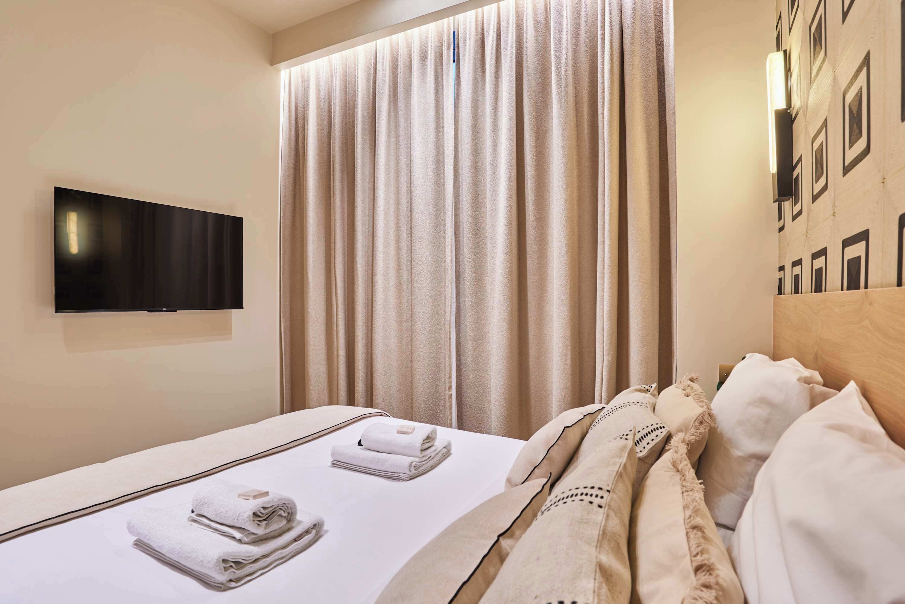 1 habitación, tabla de planchar con plancha, wifi y ropa de cama 