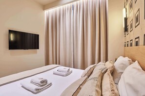 1 habitación, tabla de planchar con plancha, wifi y ropa de cama 