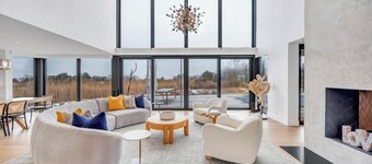 Waterfront Southampton home with dock, pool, gym, great for groups