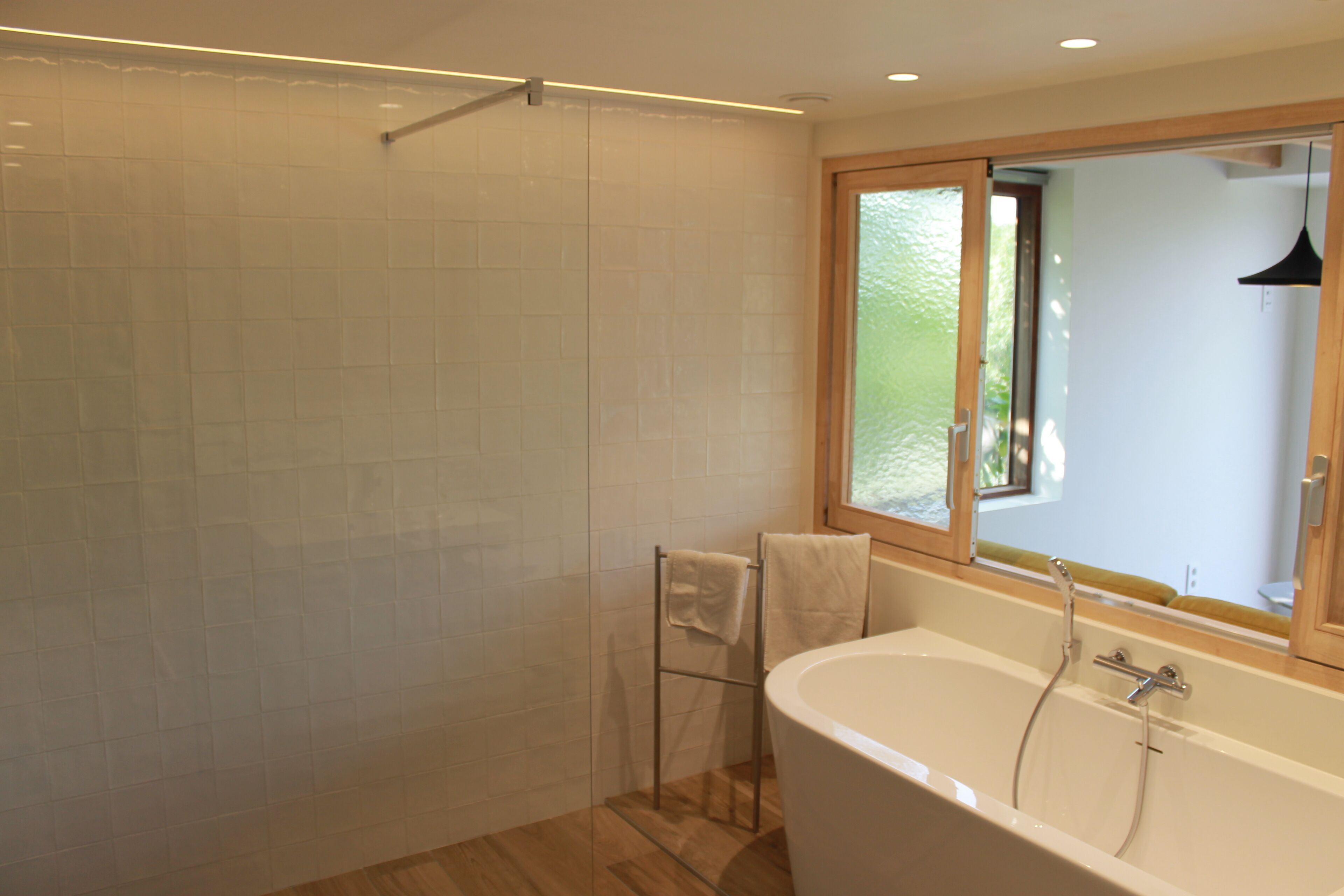 Shower, hair dryer, towels, toilet paper