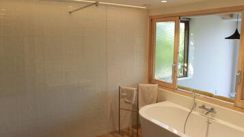 Shower, hair dryer, towels, toilet paper