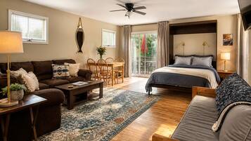 1 habitación, tabla de planchar con plancha y cuna de viaje