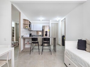 1 habitación, tabla de planchar con plancha, wifi y ropa de cama 