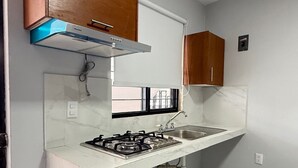 Basic Apartment, 2 Bedrooms, Mobility Accessible, Patio | Private kitchen - Residencia Gran Coyula Orange 502 (Tonala)