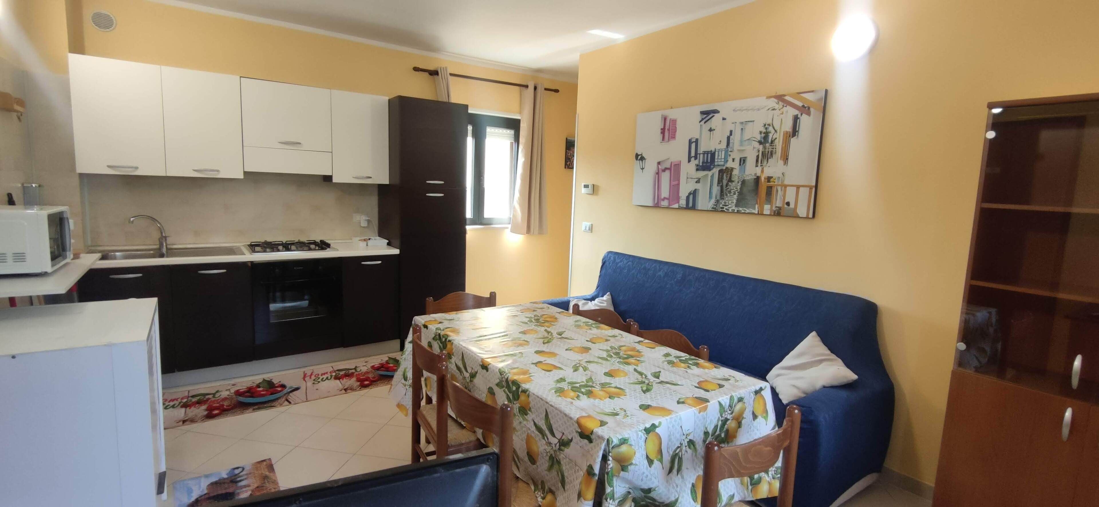 Apartamento família | Edredons de pluma, escrivaninha, espaço de trabalho para notebook