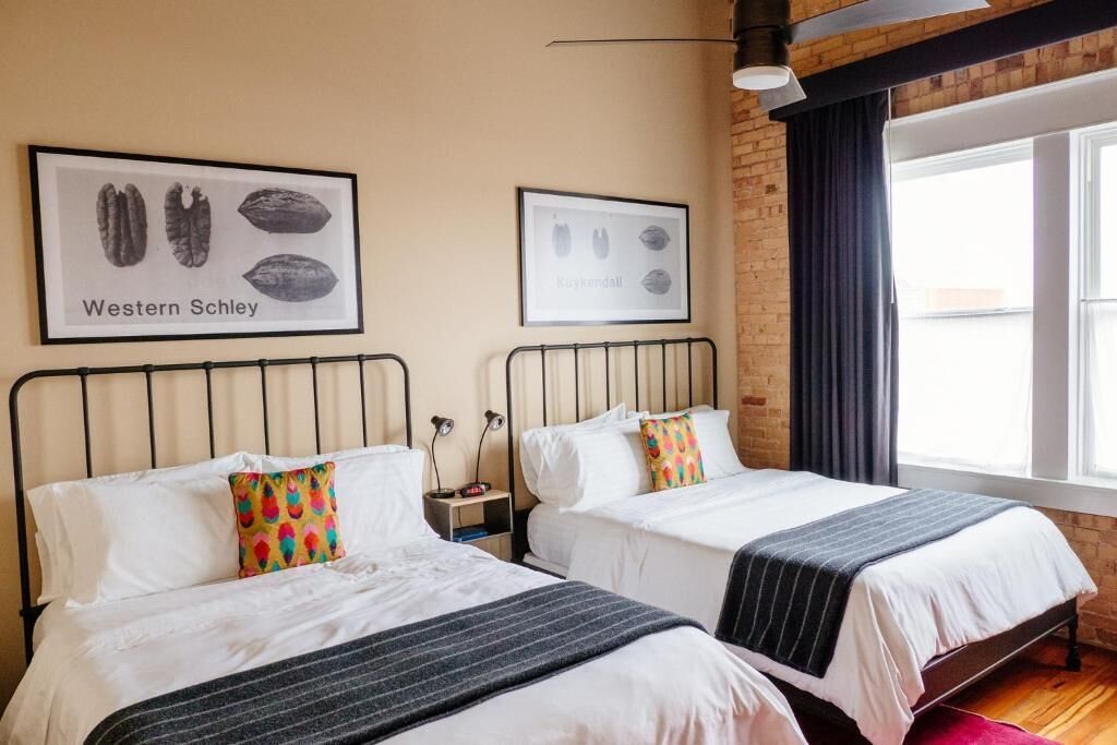 Deluxe Quadruple Room, City View | Desk, laptop workspace, free WiFi