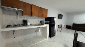 Appartement, patio, dans la tour | Cuisine privée