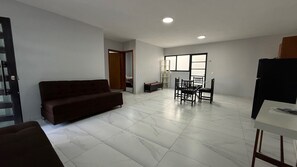 Basic Apartment, Patio, Tower | Living area - Residencia Gran Coyula Orange 504A (Tonala)